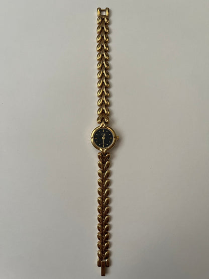 Gold Tone Watch with Black Round Dial