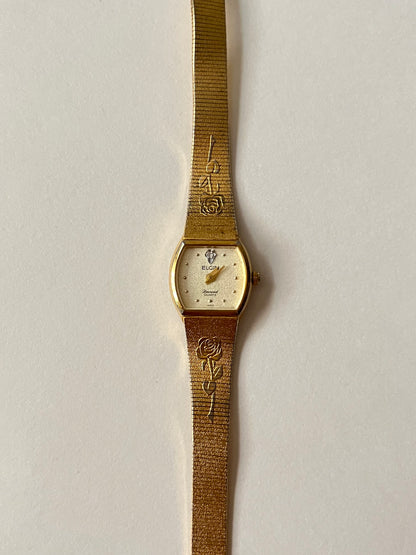 Elegant Vintage Gold Tone Watch with Rose Stem Accents