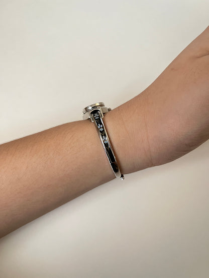 Beautiful Silver Tone Open Cuff Peekaboo Swiss Watch with Black Floral Enameled Bracelet