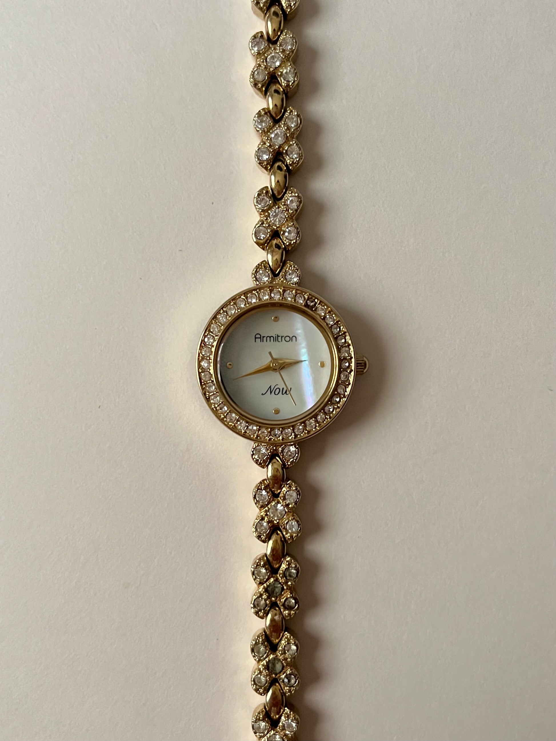 Lovely Gold Tone Armitron Now Watch with Rhinestones Encrusted Bezel and Bracelet