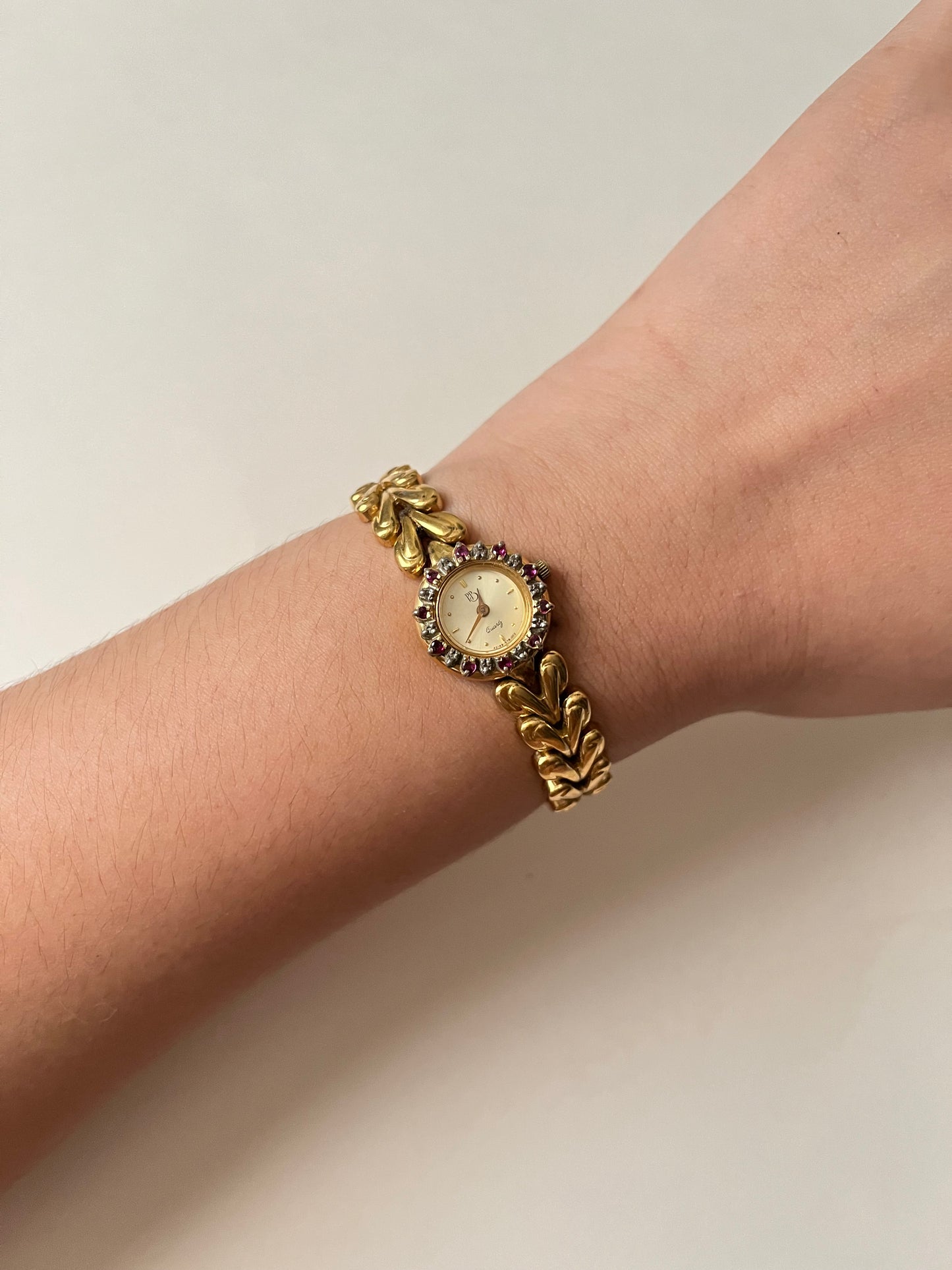 Beautiful Vintage Gold Tone Swiss Watch with Interchangeable Rubies and Sapphires Inset Bezels