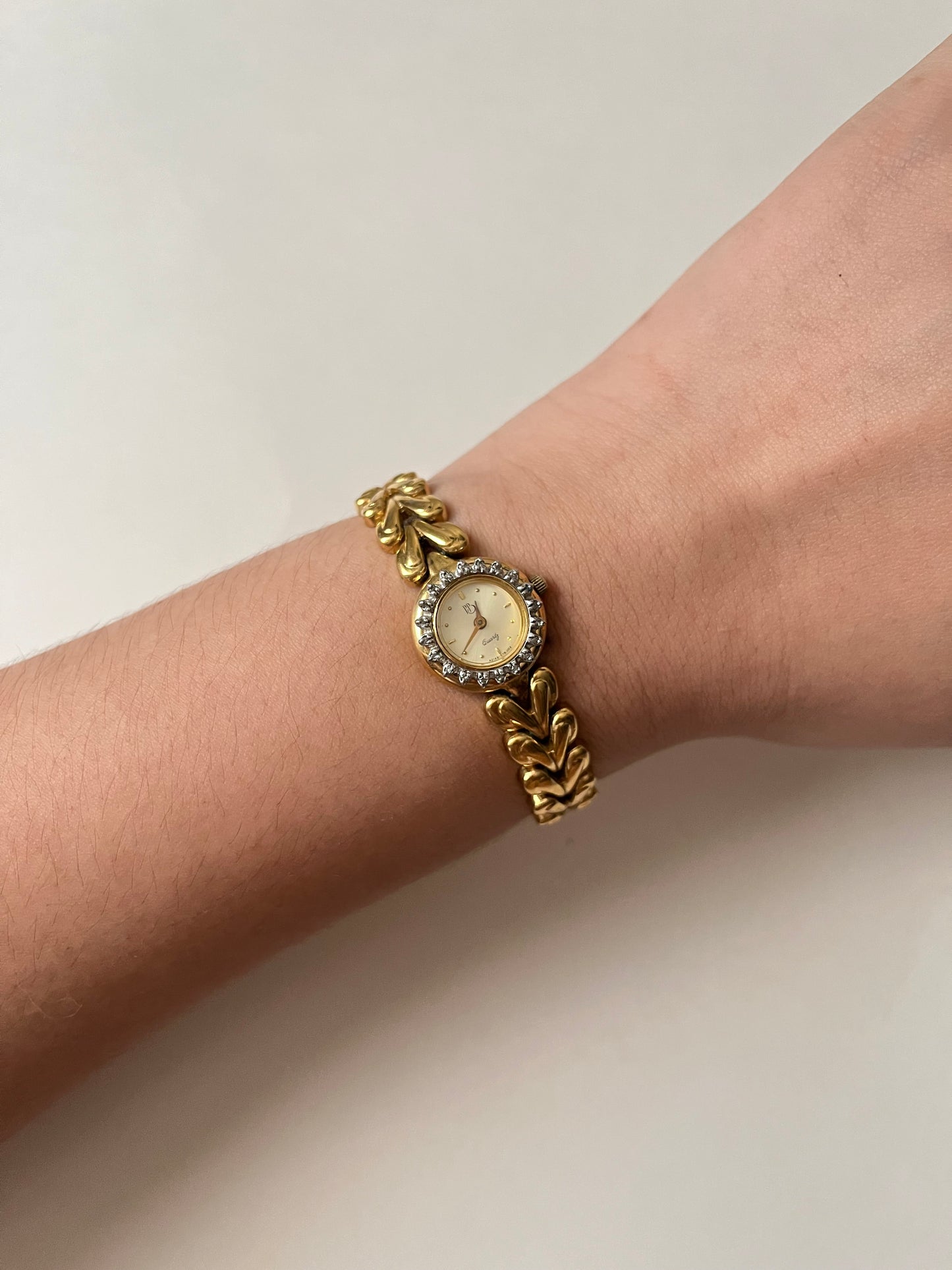 Beautiful Vintage Gold Tone Swiss Watch with Interchangeable Rubies and Sapphires Inset Bezels