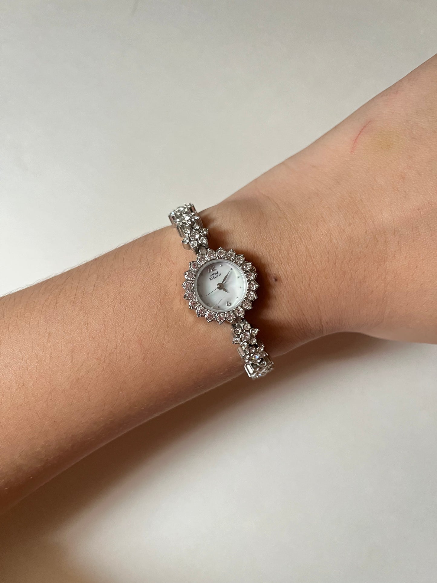 Amazing Silver Tone Anne Klein Watch with Clear Floral Rhinestones Bracelet