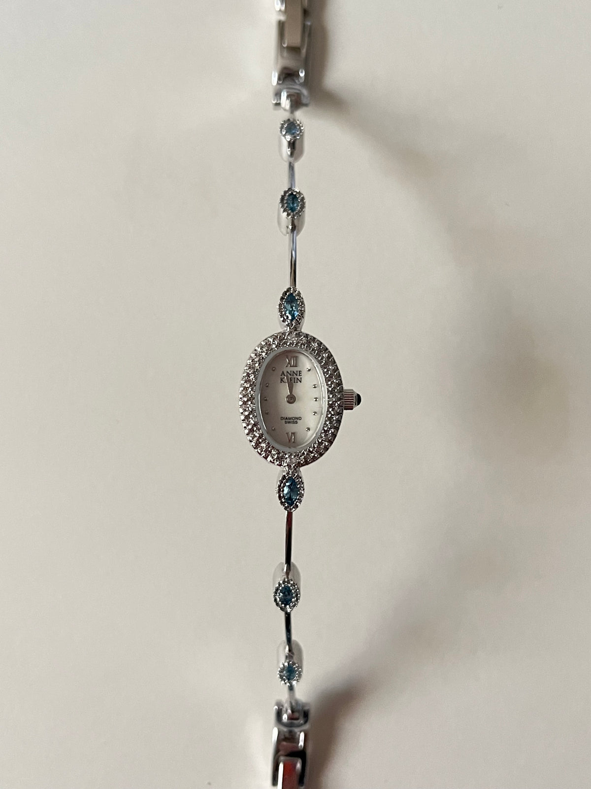 Very Dainty Silver Tone Swiss Watch with Real Diamonds and Light Blue Stones Accents