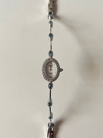 Very Dainty Silver Tone Swiss Watch with Real Diamonds and Light Blue Stones Accents