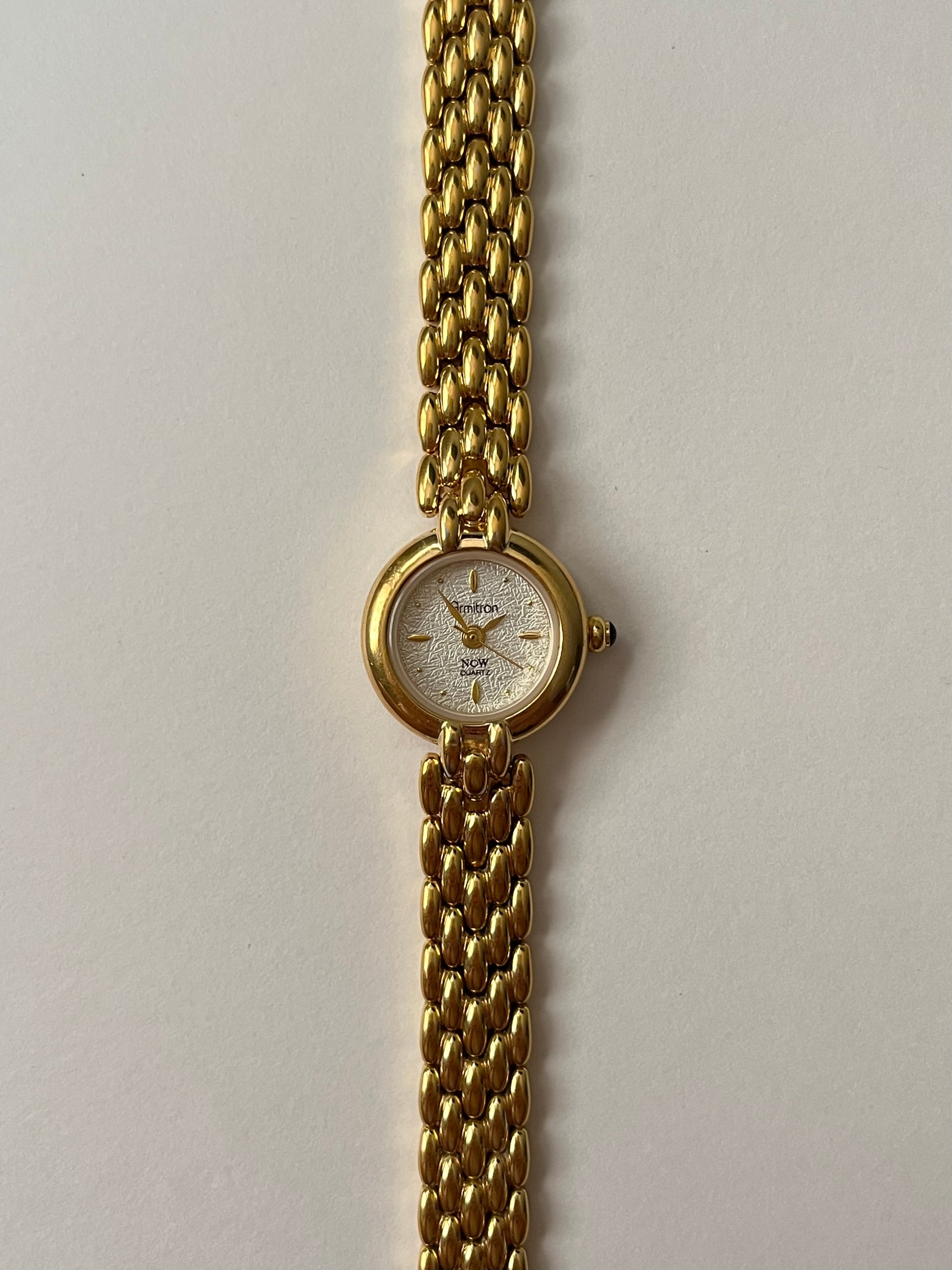 Beautiful Gold Tone Watch with Dainty Round Textured Dial