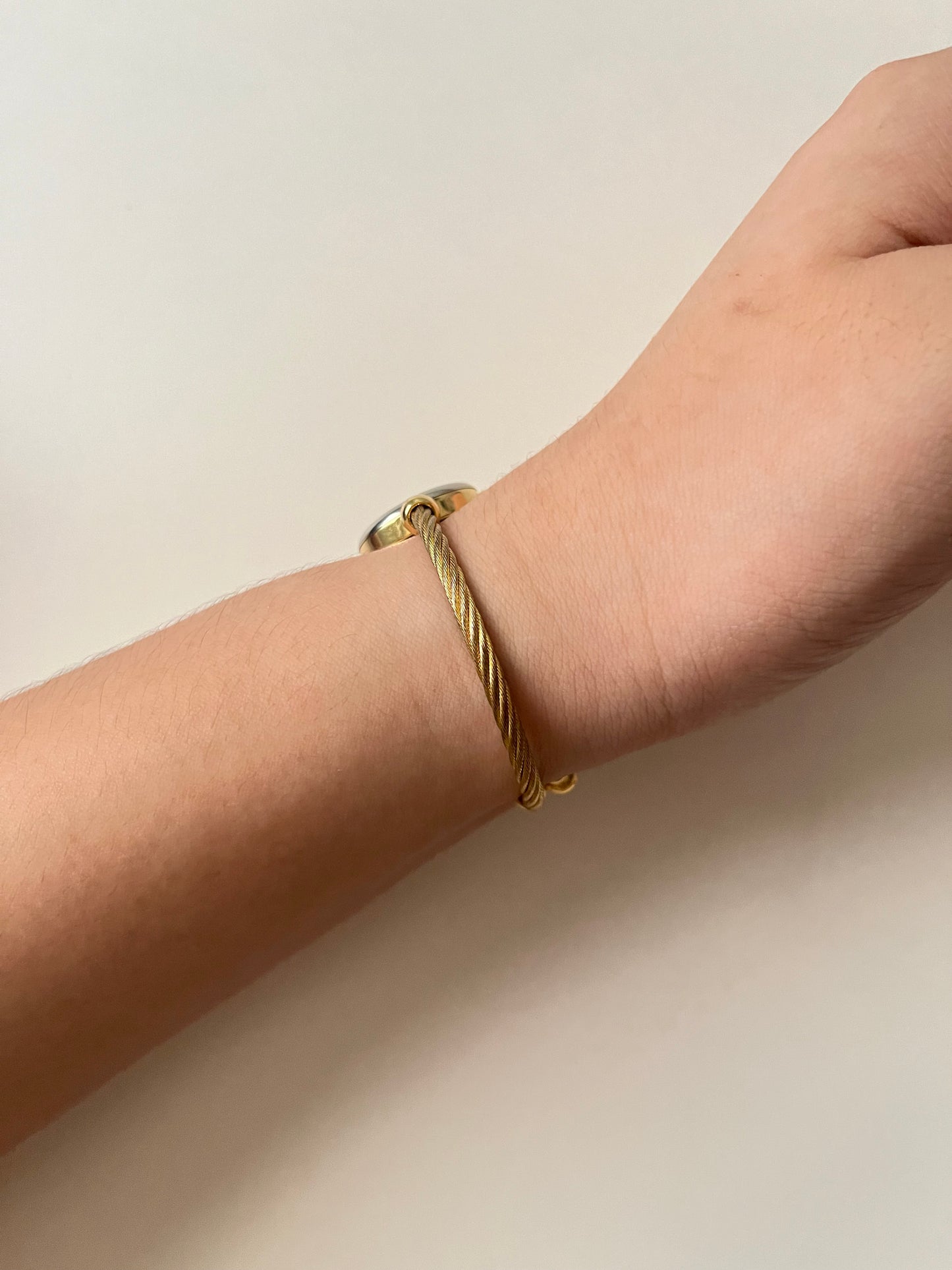 Gold Tone Open Cuff Watch with Interchangeable Bezels