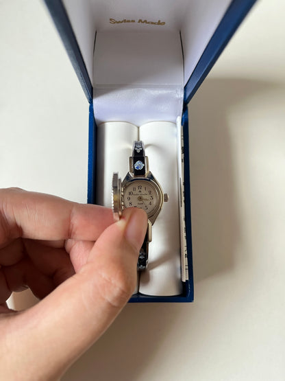 Beautiful Silver Tone Open Cuff Peekaboo Swiss Watch with Black Floral Enameled Bracelet