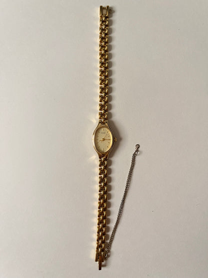 Lovely Dainty Gold Tone Seiko Watch with Oval Dial