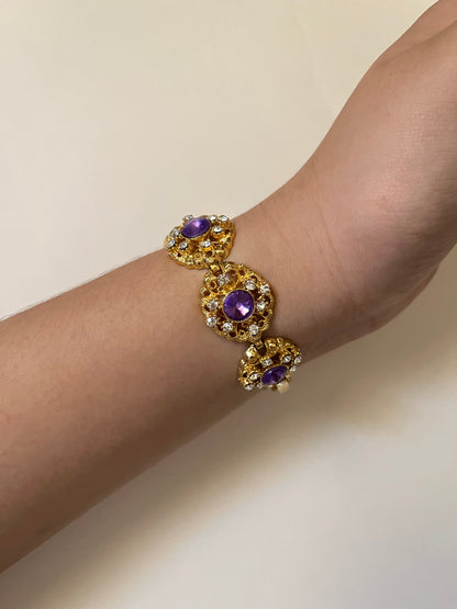 Extremely Rare and Breathtaking Gold Tone Watch with Ornate Band Design and Purple and Pink Stones Accent