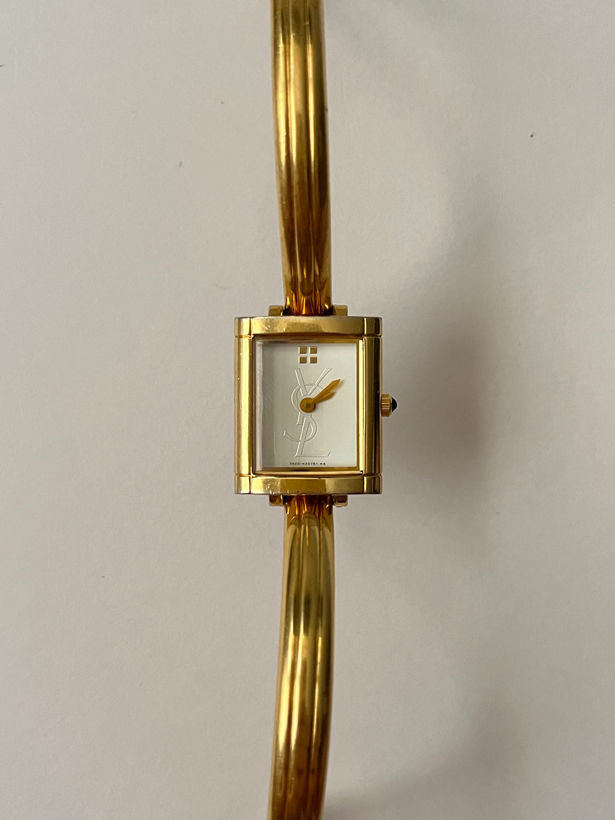 Elegant Gold Tone Yves Saint Laurent Tank Style Cuff Watch