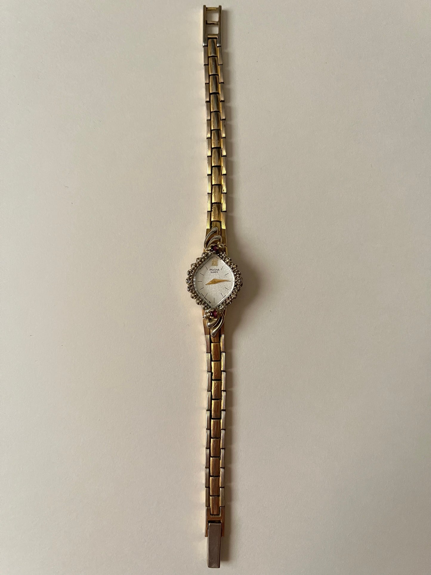 Lovely Gold Tone Pulsar Watch with Rubies Accent and Diamond-Shaped Dial