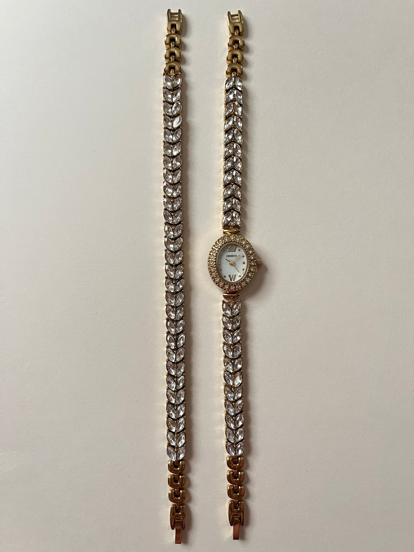 Astonishing Gold Tone Watch and Bracelet Set with Marquise Cut Gem Encrusted Band