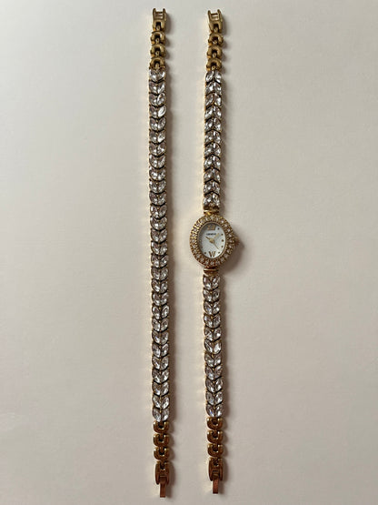 Astonishing Gold Tone Watch and Bracelet Set with Marquise Cut Gem Encrusted Band