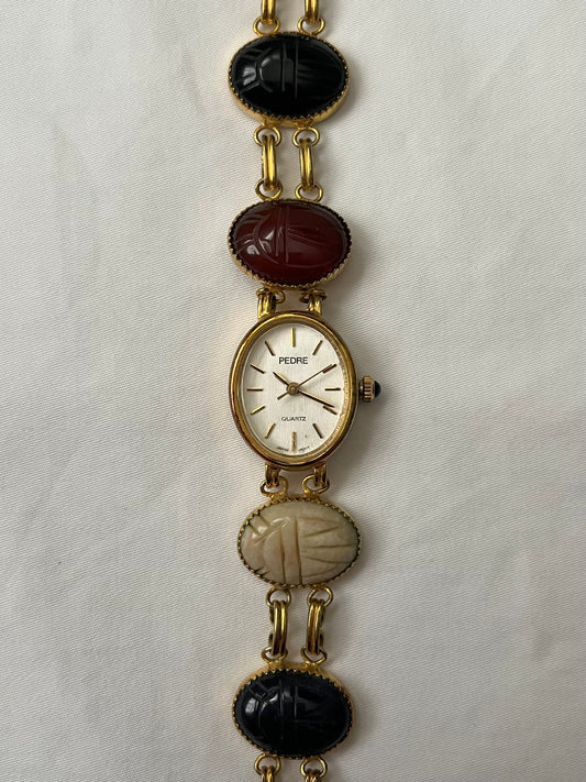 Rare Vintage Gold Tone Watch with Scarab Carved Multi-Stones Band