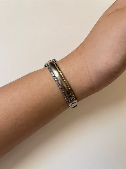 Silver Tone Anne Klein Cuff Watch with Oval Dial and Pink Stones Accent