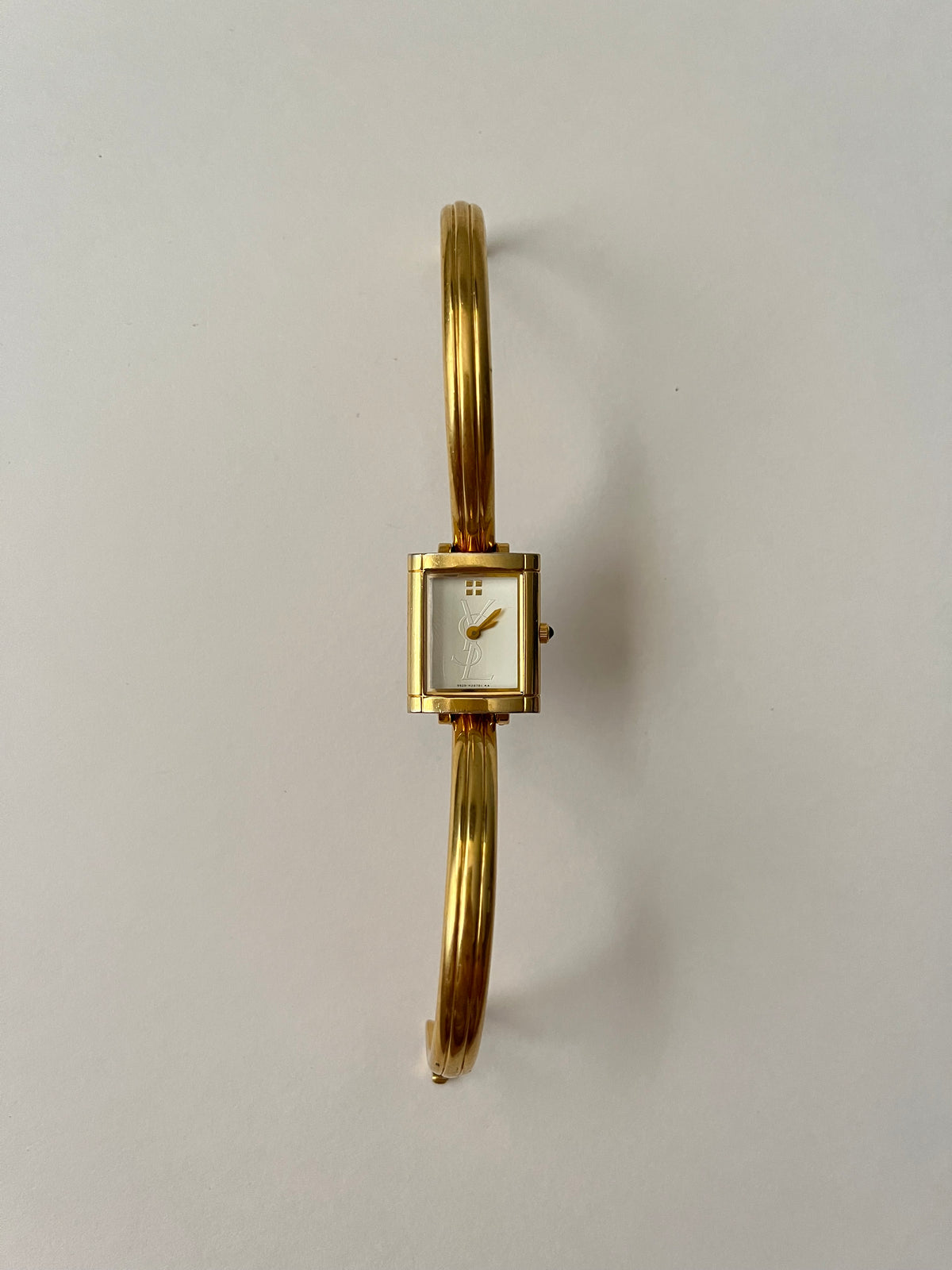 Elegant Gold Tone Yves Saint Laurent Tank Style Cuff Watch