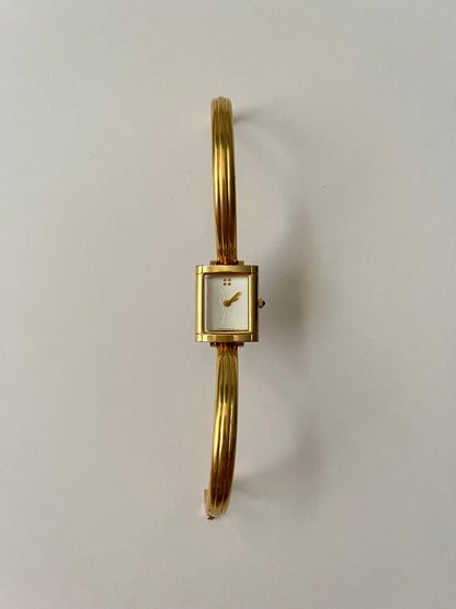 Elegant Gold Tone Yves Saint Laurent Tank Style Cuff Watch