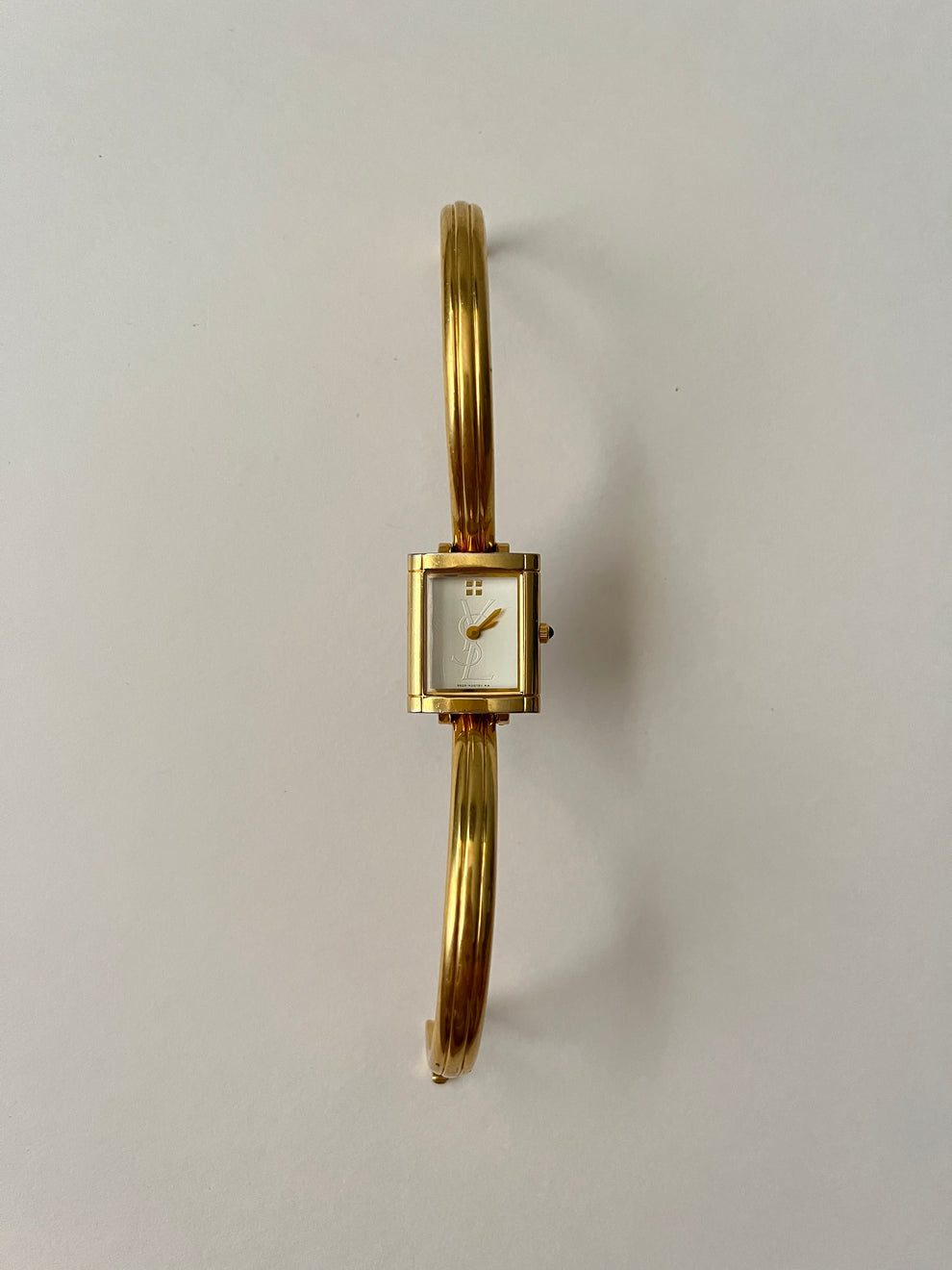 Elegant Gold Tone Yves Saint Laurent Tank Style Cuff Watch – 143 Vintage
