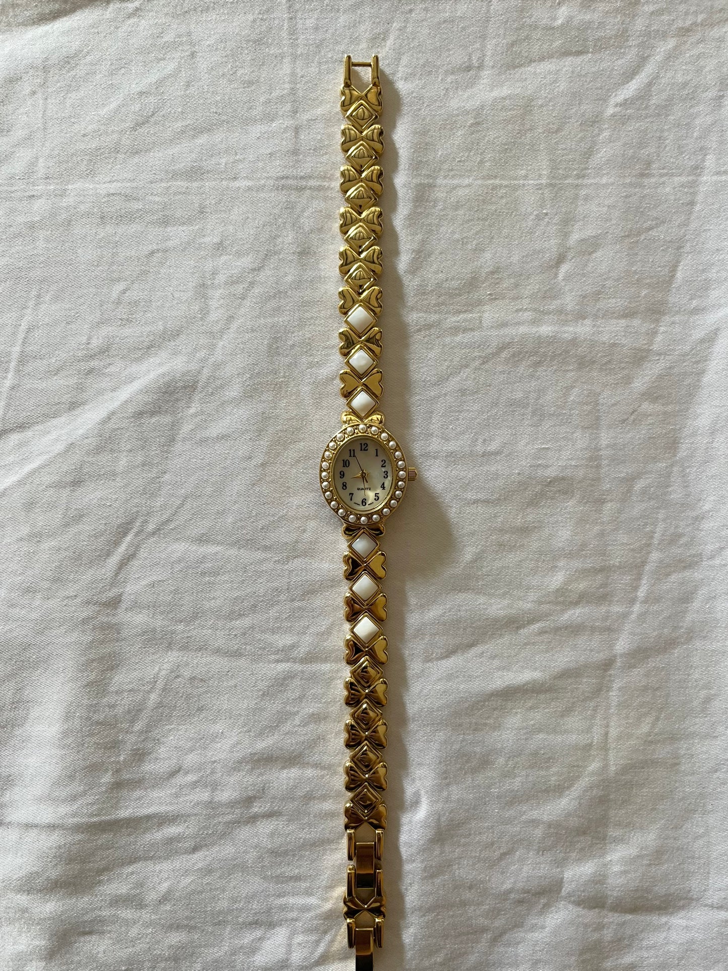 Beautiful Gold Tone Watch with White Pearl Accents