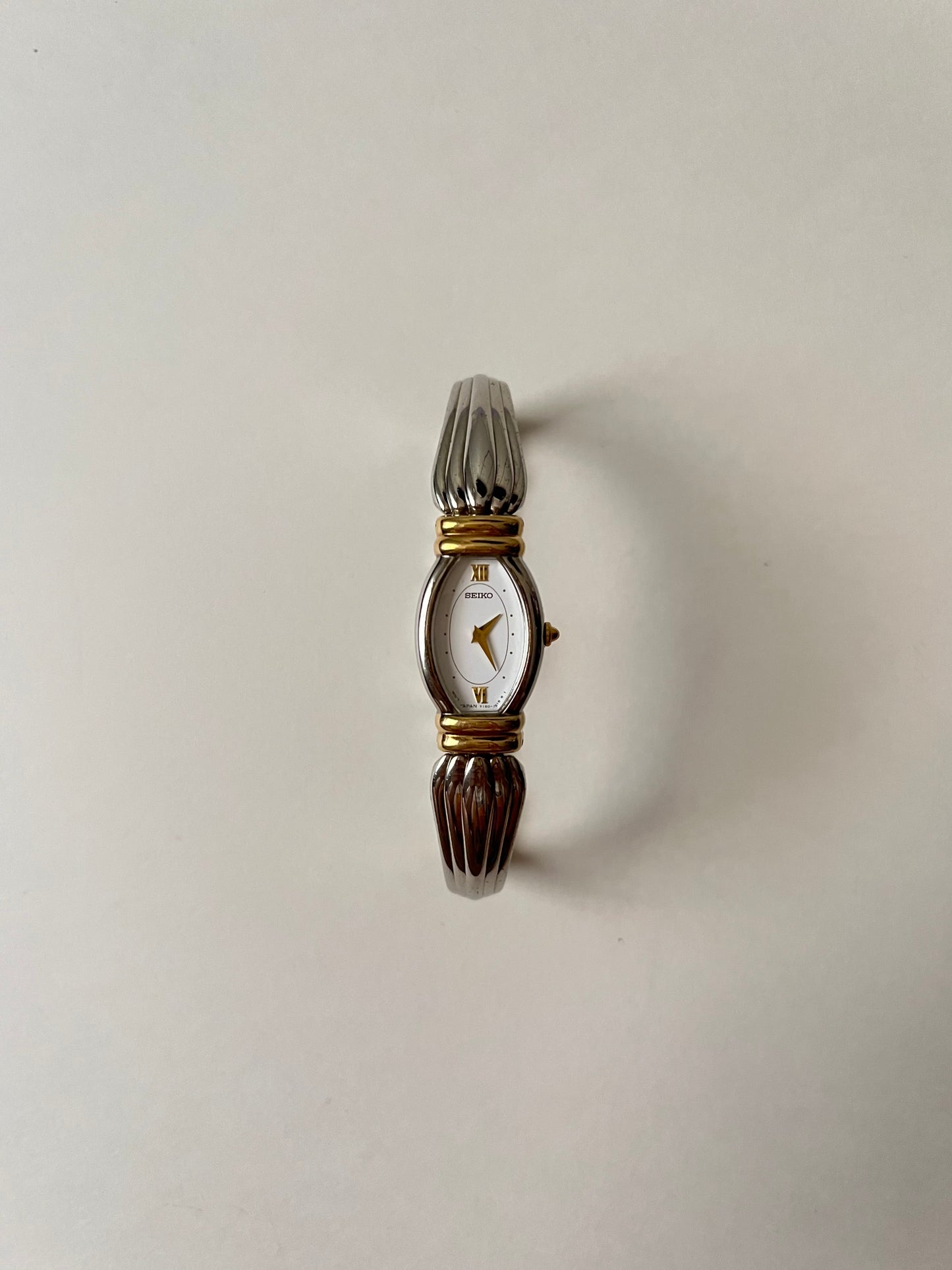 Art Deco Style Two Toned Seiko Half Cuff Watch with Oval Dial
