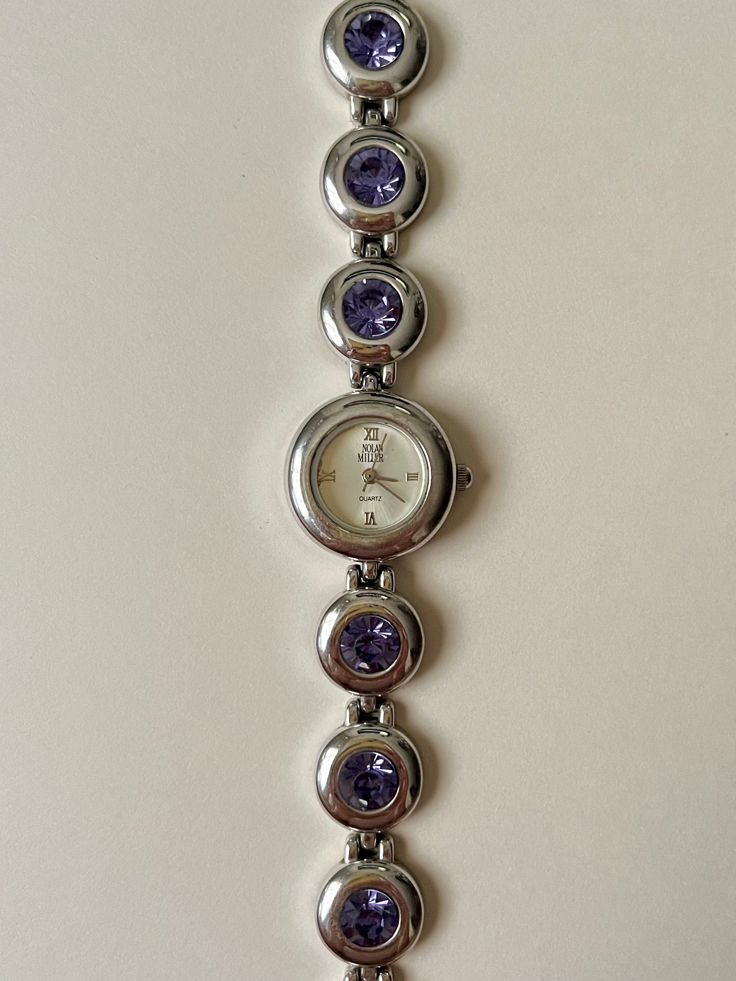 Adorable Silver Tone Watch with Purple Stones Accent