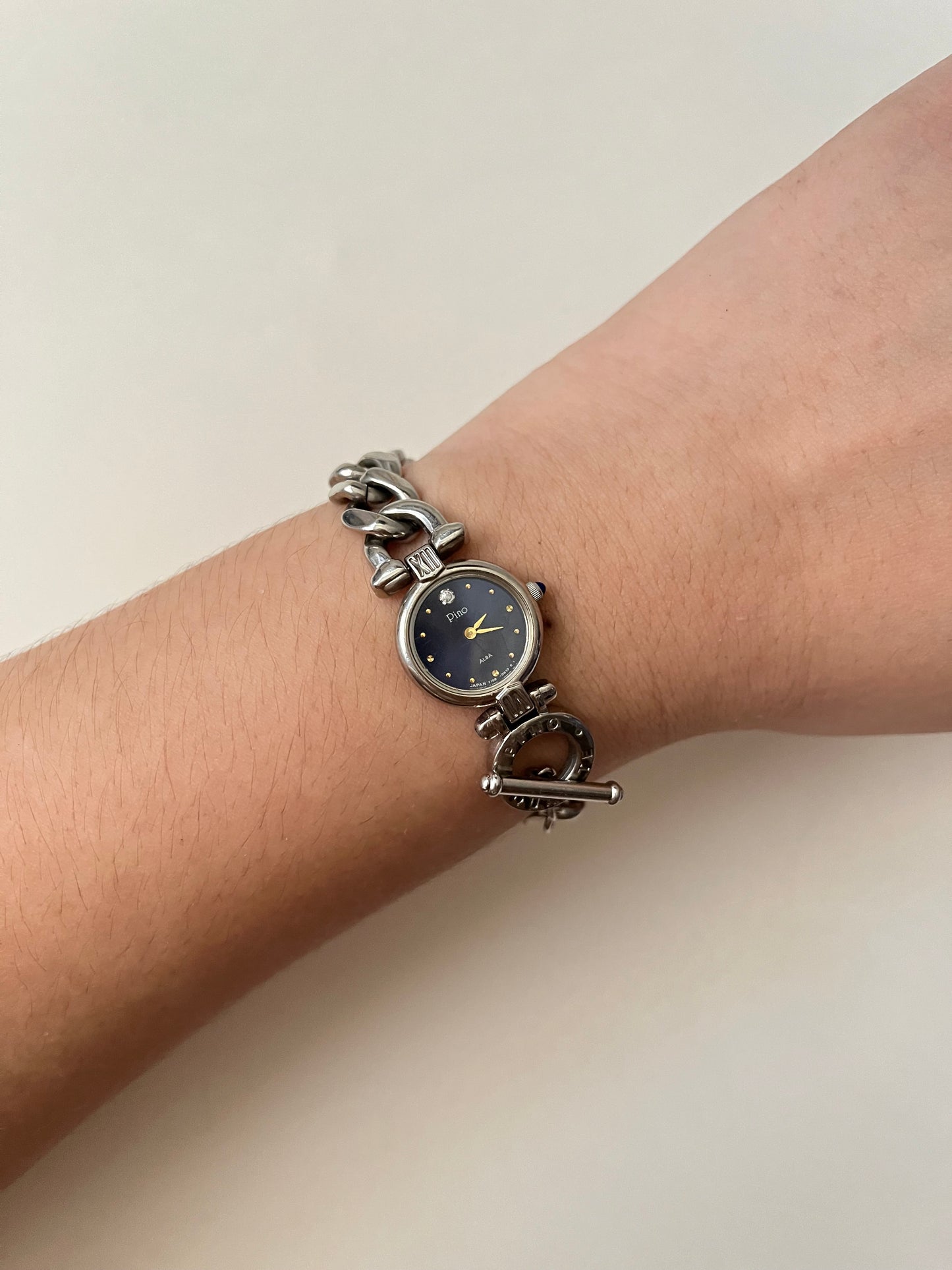 Rare Silver Tone Watch with Toggle Lock Closure and Blue Round Dial