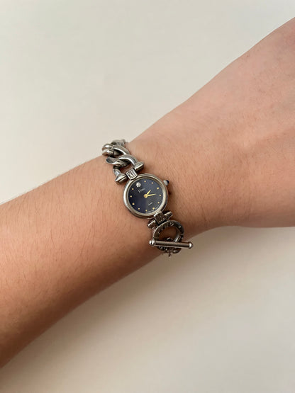 Rare Silver Tone Watch with Toggle Lock Closure and Blue Round Dial