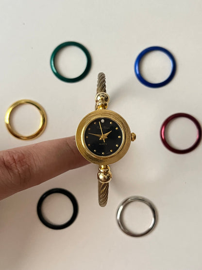 Gold Tone Open Cuff Watch with Interchangeable Bezels
