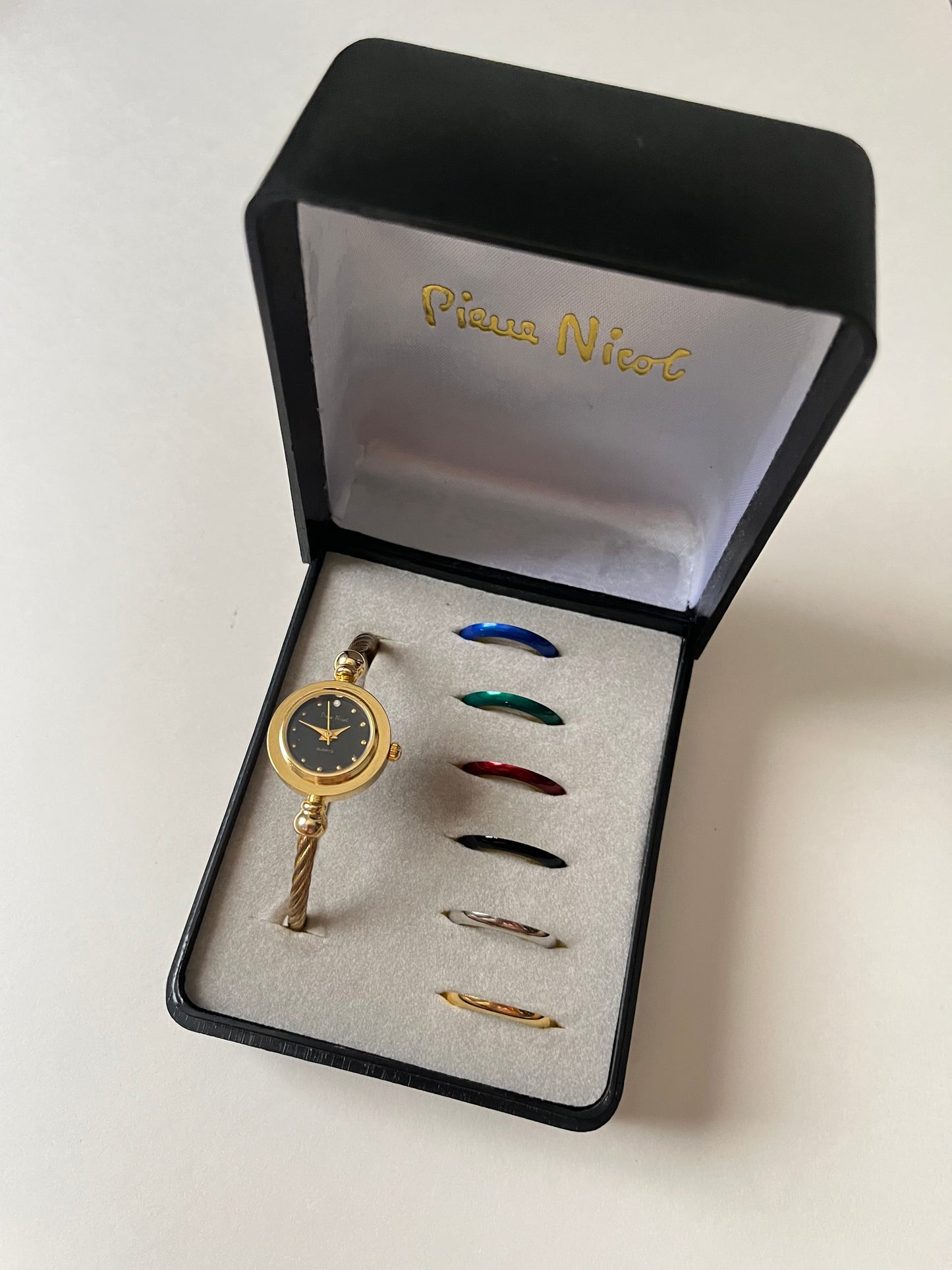 Gold Tone Open Cuff Watch with Interchangeable Bezels