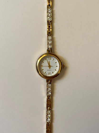 Dainty Gold Tone Watch with Round Dial and Rhinestones Accent