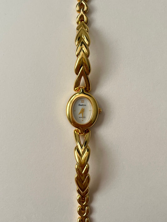 Absolutely Stunning Gold Tone Half Cuff Watch with Oval Dial
