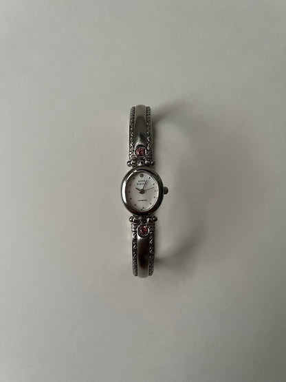 Silver Tone Anne Klein Cuff Watch with Oval Dial and Pink Stones Accent