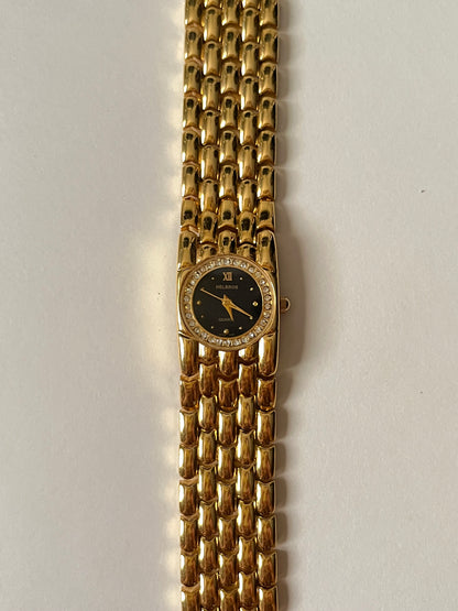 Very Chic Gold Tone Watch with Black Round Dial and Rhinestones Accent