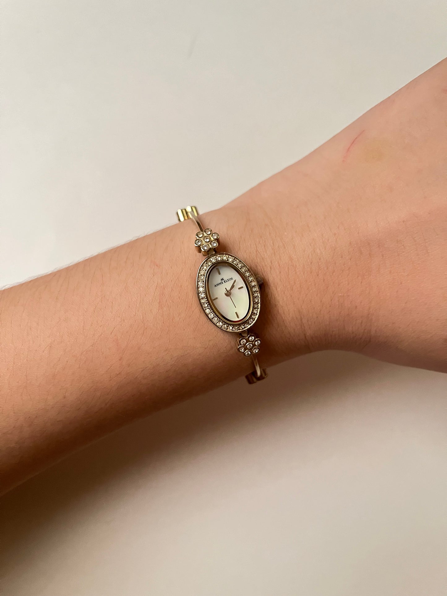 Super Dainty Gold Tone Anne Klein Watch with Rhinestones Accent