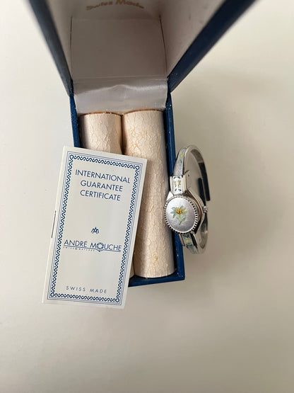 Beautiful Silver Tone Open Cuff Peekaboo Swiss Watch with White Floral Enameled Bracelet