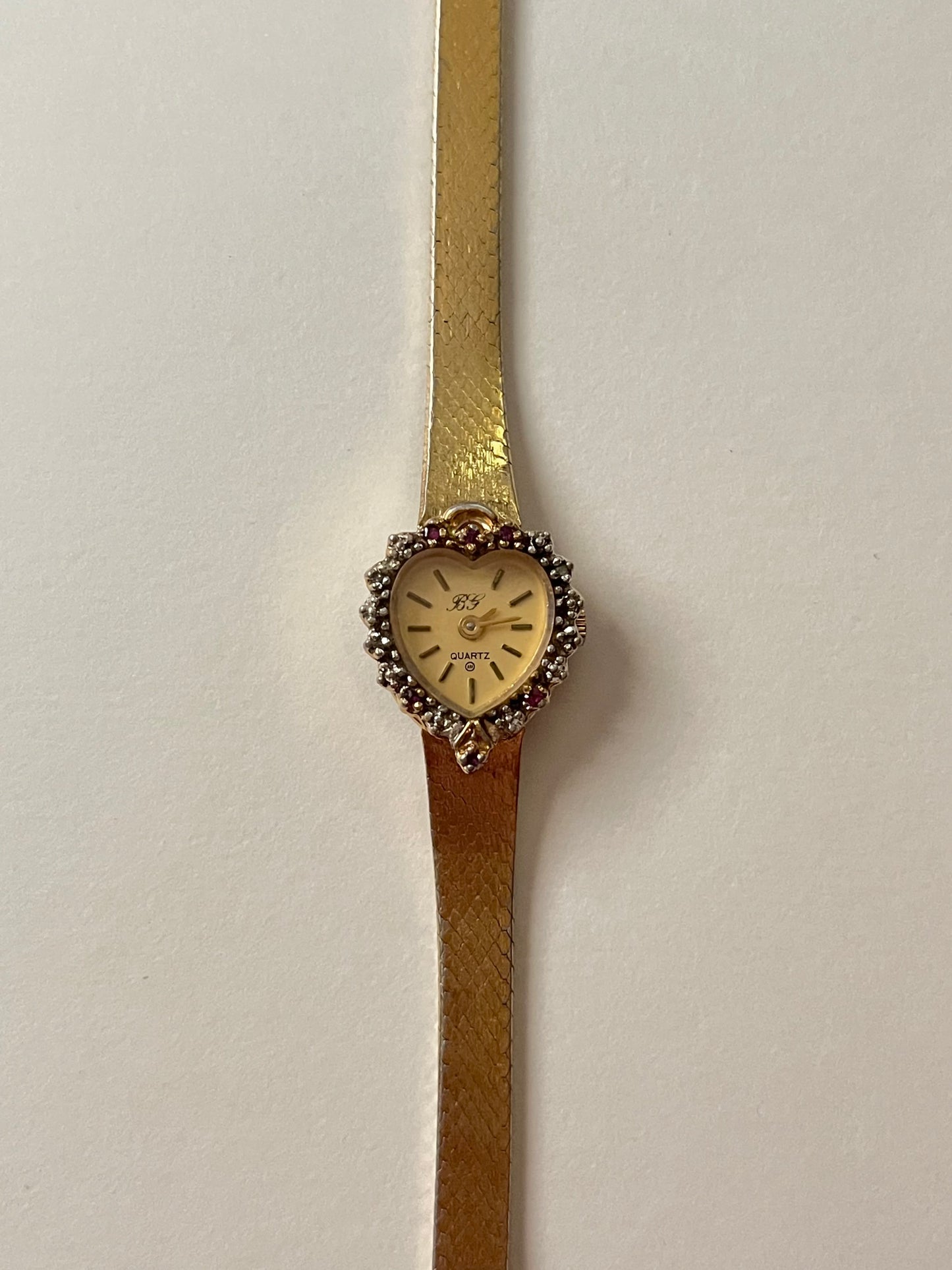 Very Rare and Stunning Gold Tone Italy Made Watch with Heart Shaped Bezel and Real Diamonds and Rubies Accent
