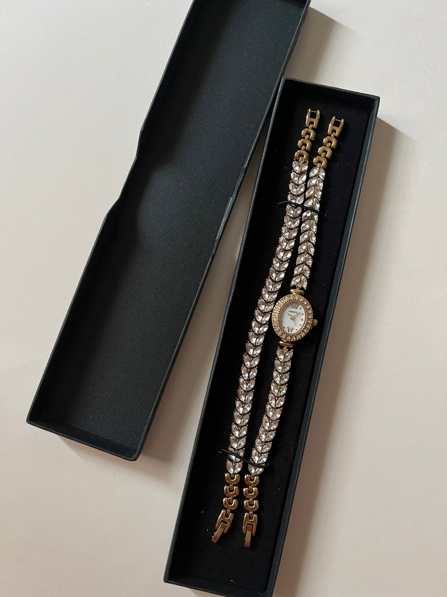 Astonishing Gold Tone Watch and Bracelet Set with Marquise Cut Gem Encrusted Band