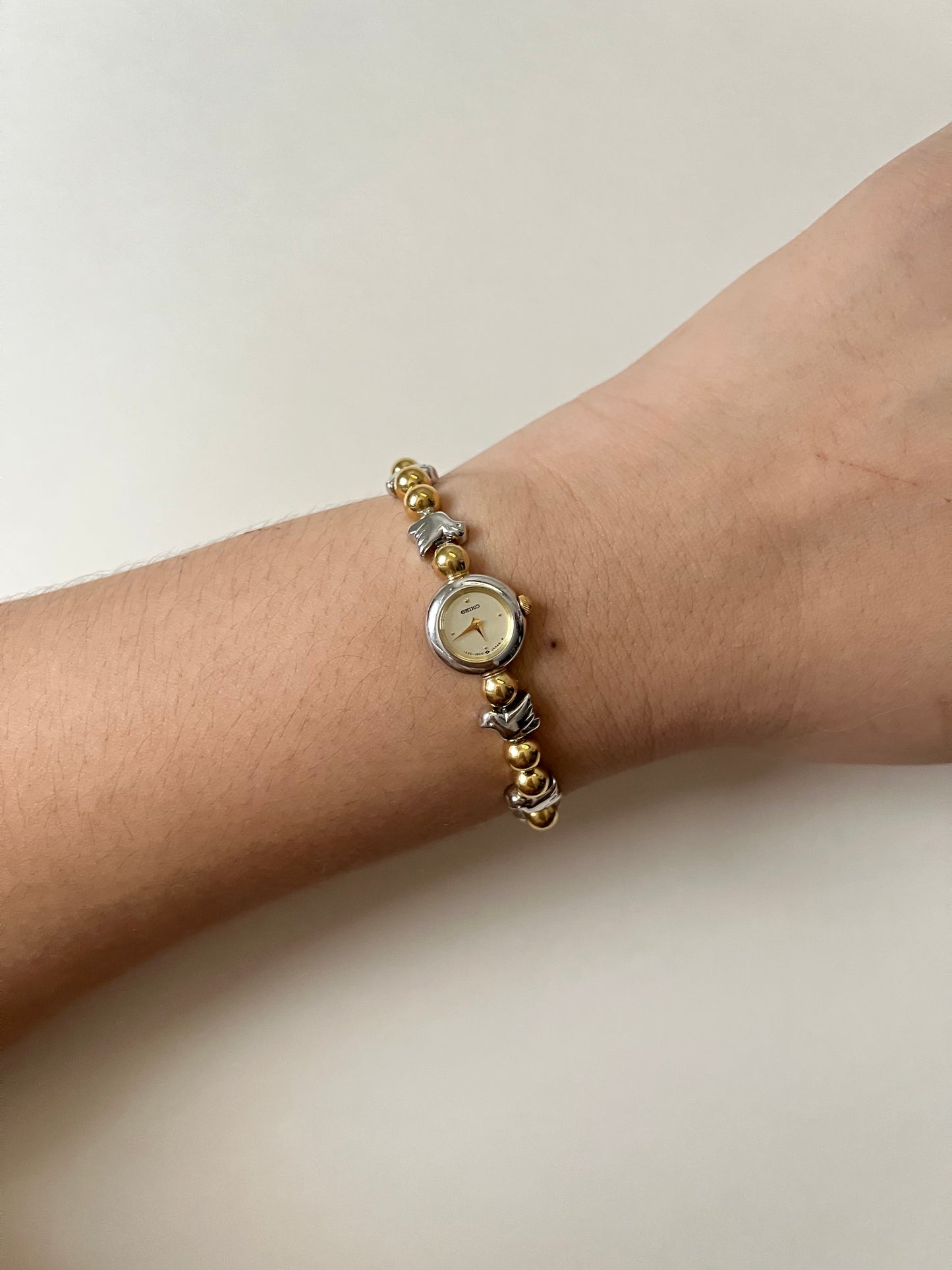 Extremely Rare and Dainty Two Toned Seiko Watch with Dove Bird Accents