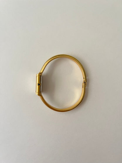Elegant Gold Tone Yves Saint Laurent Tank Style Cuff Watch