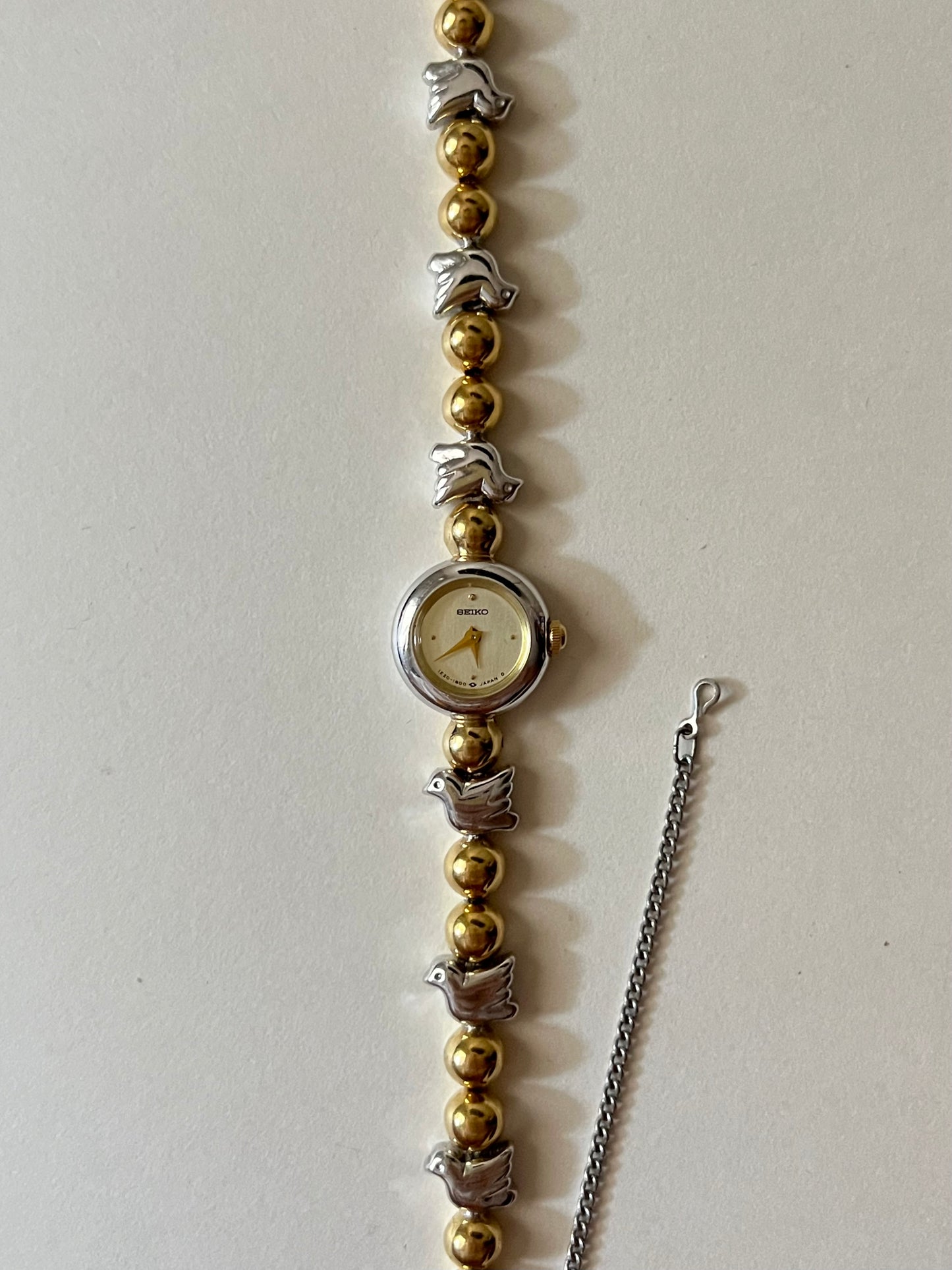 Extremely Rare and Dainty Two Toned Seiko Watch with Dove Bird Accents