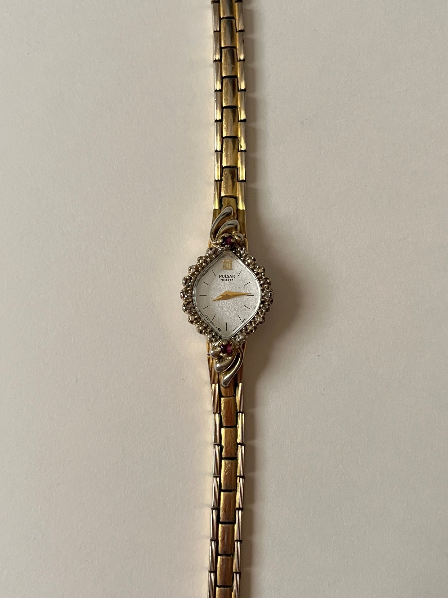 Lovely Gold Tone Pulsar Watch with Rubies Accent and Diamond-Shaped Dial