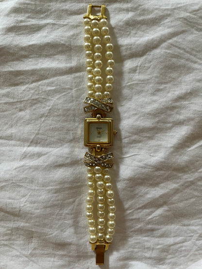 Beautiful Gold Tone Watch with Faux Pearl Bands and Bejeweled Cross Accent